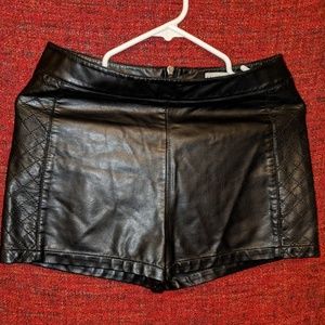 Leather shorts.